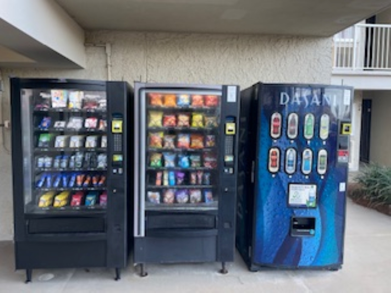 A variety of vending machines on property (drinks, snacks, Mini Melts & Sundries). We just got a new one that has sundries in it, like sunscreen, first aid kits, and charging cords.