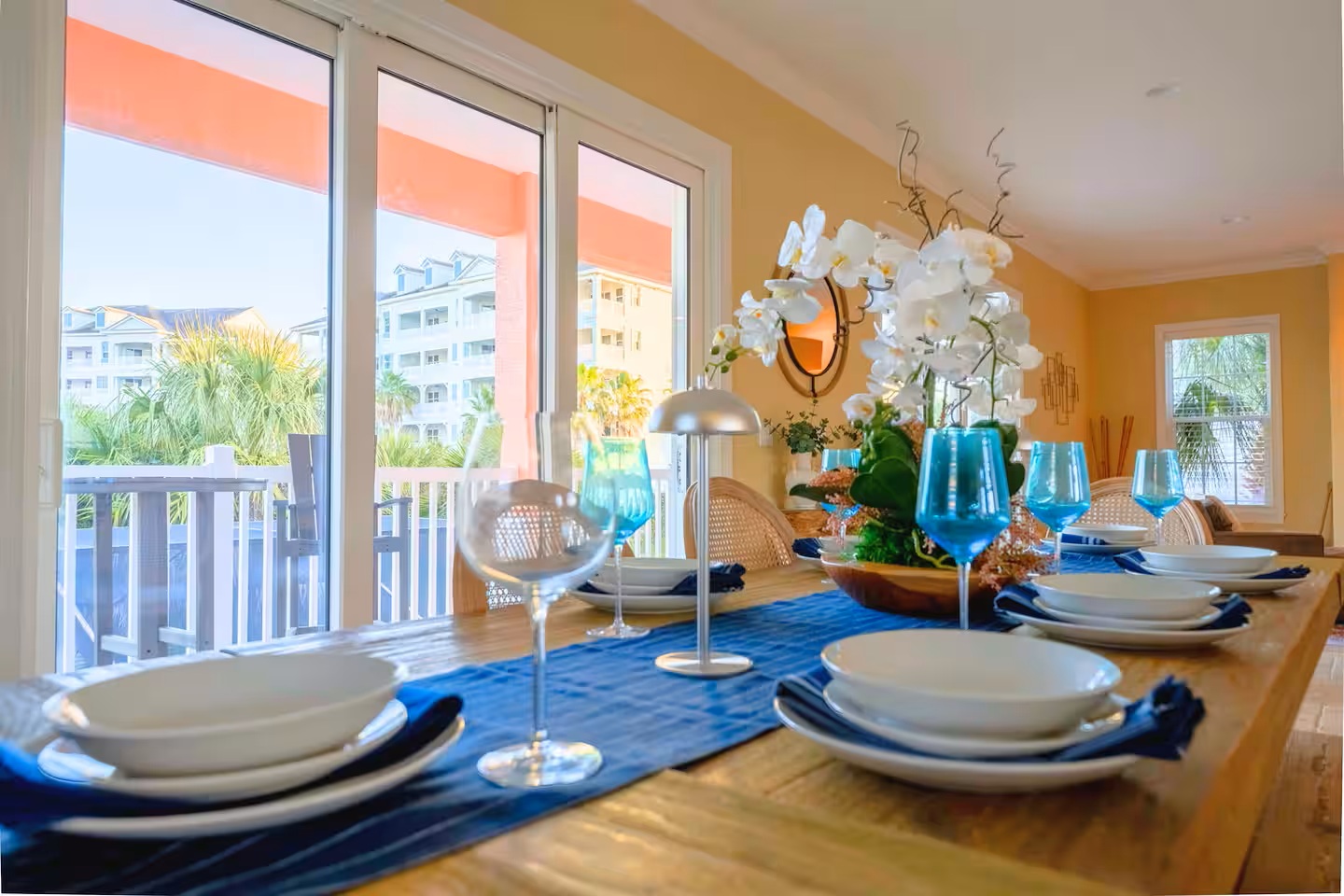 Gather around the table and make memories 🍽️
This bright dining space opens to the balcony, offering a beautiful setting for family meals, celebrations, and relaxed coastal evenings.
