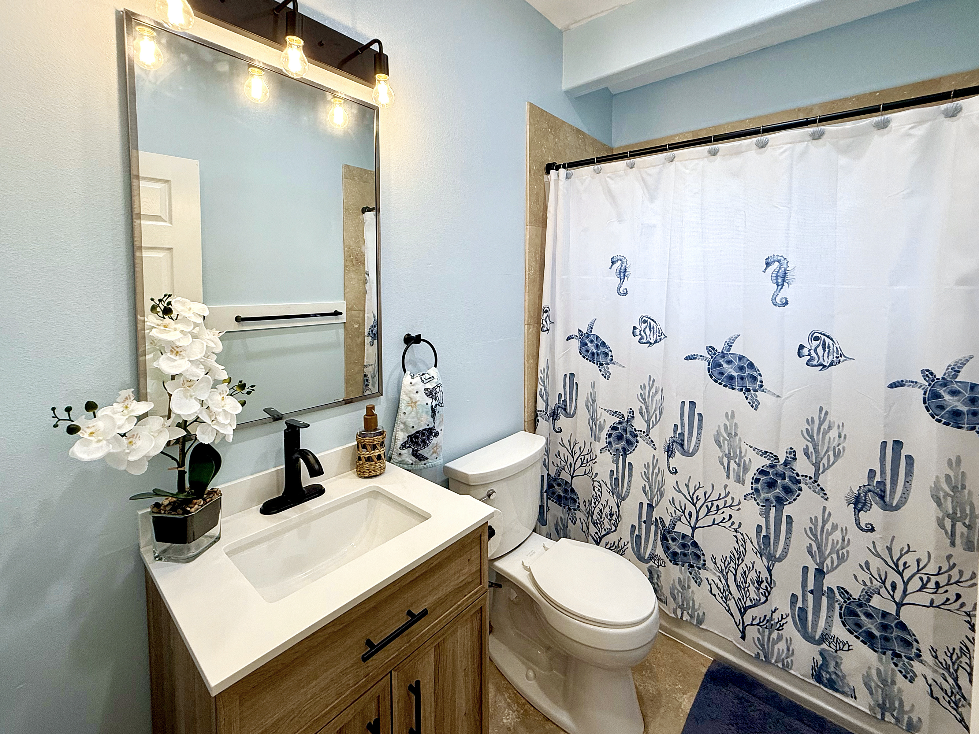 Full Bathroom 1 of 2 | Representative Interior. Finishes, decor, and furniture, vary by duplex unit.