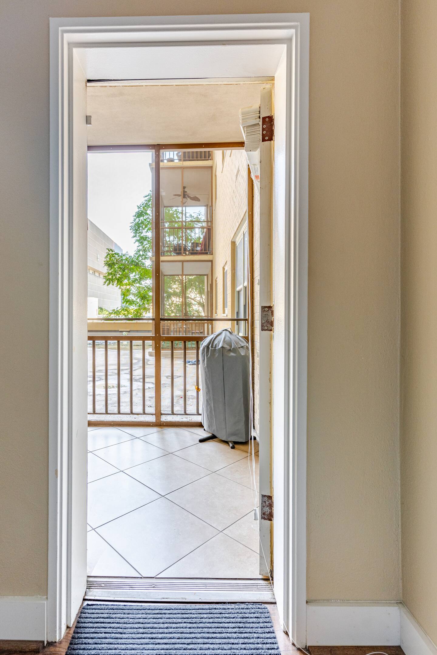 Direct balcony access opens to a private outdoor space, perfect for relaxing and enjoying the fresh air.