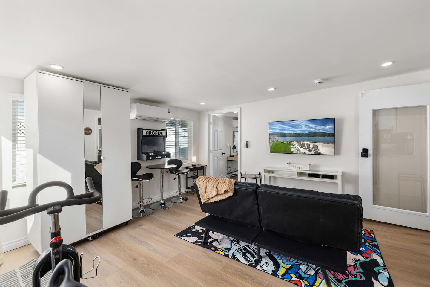 Game room w/ arcade, big screen smart TV, exercise bike. Attached Bedroom 3 and bath 3. 