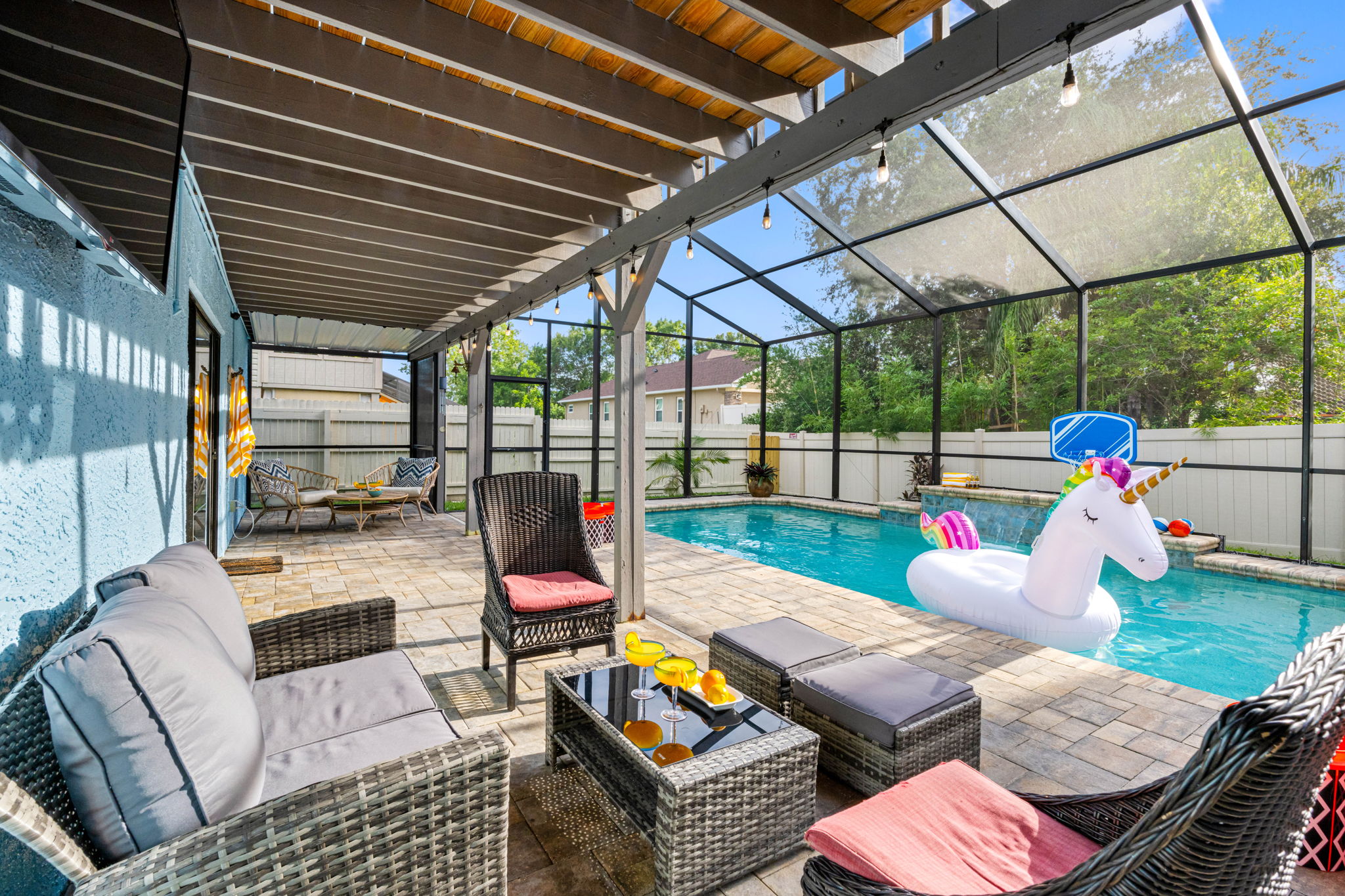From plush loungers and patio swings to the floating unicorn in the pool, this outdoor area brings the fun for guests of all ages