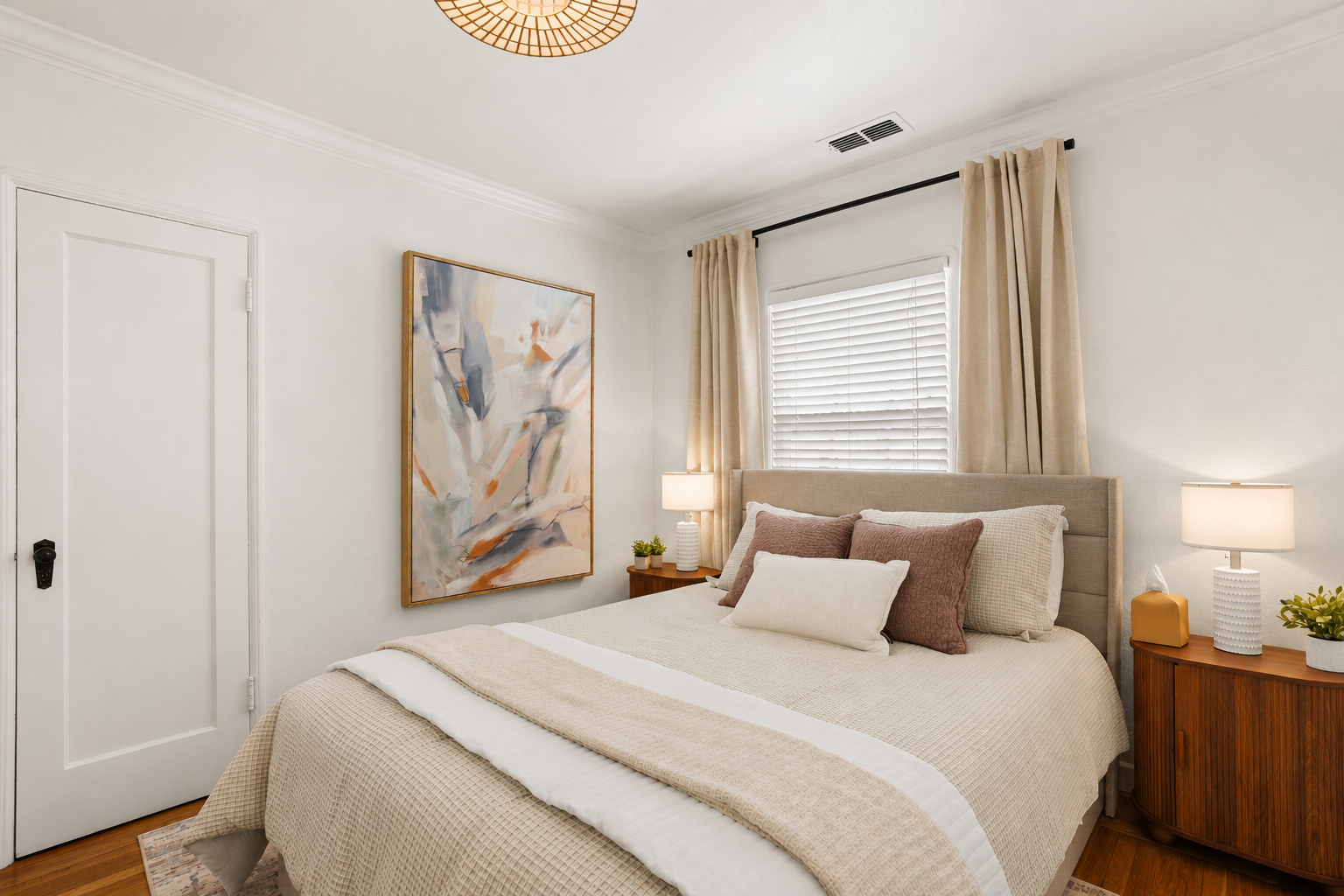 Bedroom 1 features a comfortable queen bed, soft linens, calming decor, and a relaxing space to unwind and recharge.