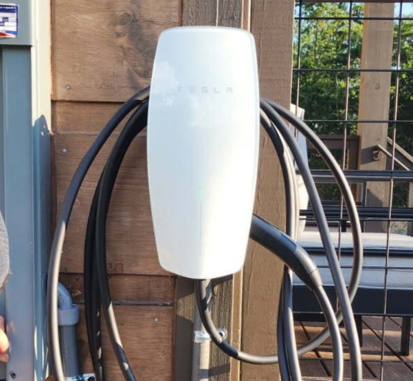 EV Charging Available The property features an EV charger - a Tesla Universal Charger compatible with all electric vehicles.