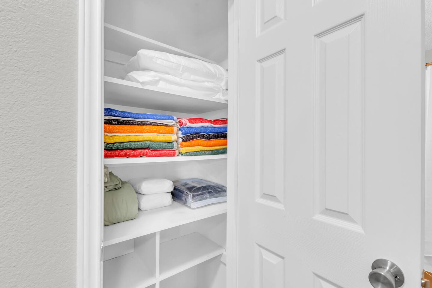 Convenient storage closet offering additional space for luggage, cleaning supplies, or extended-stay essentials.