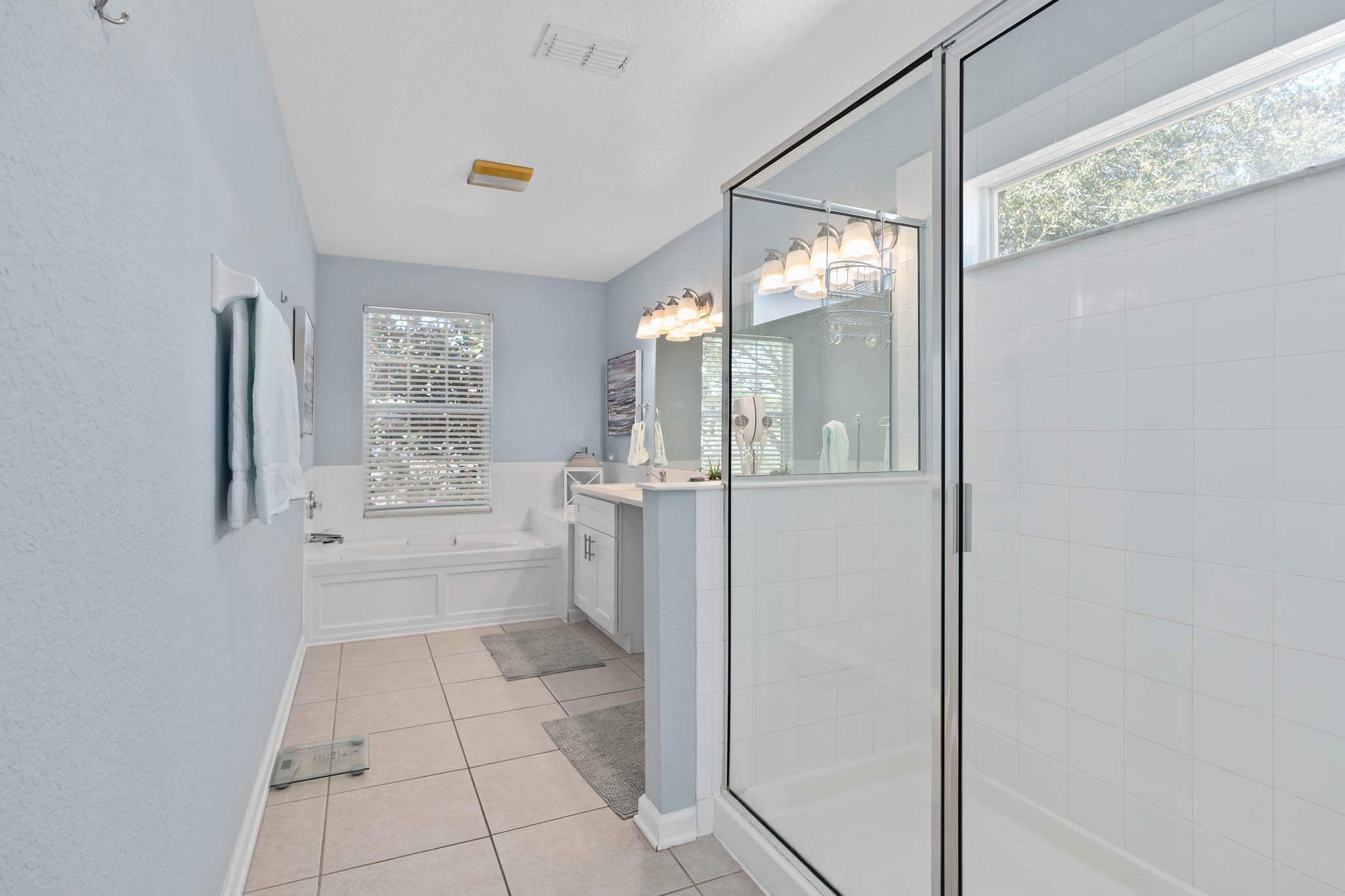 Upstairs ensuite with shower and soaker tub