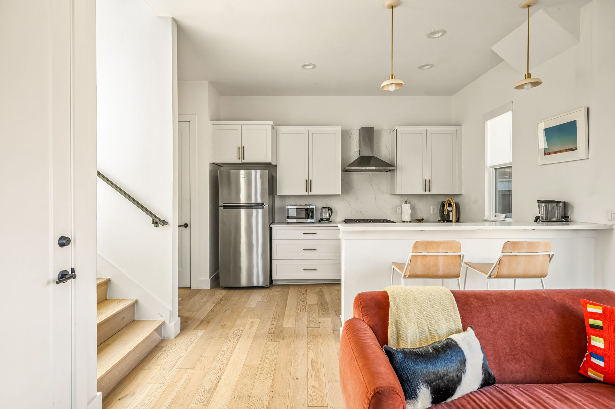 Open-concept living area seamlessly connected to the kitchen and dining space