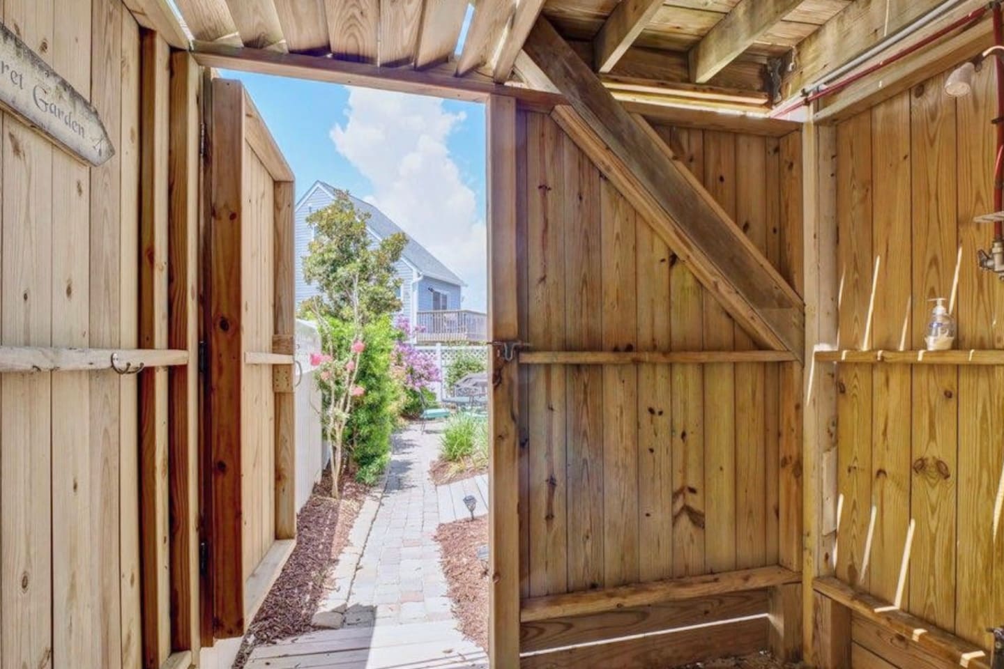 One of the outdoor showers that doubles as access to the backyard.