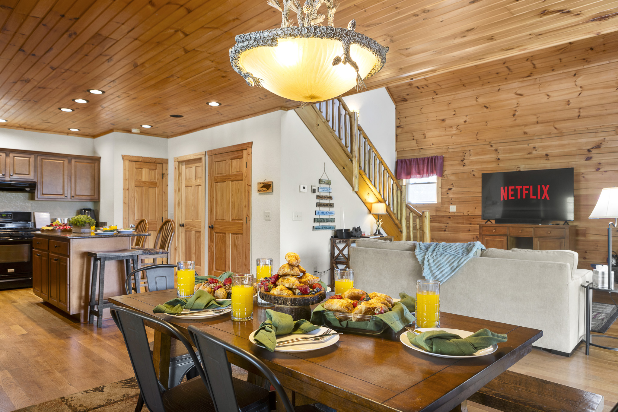 Dining & Living Area: Savor meals by the fireplace, then unwind with Netflix in this inviting space!

