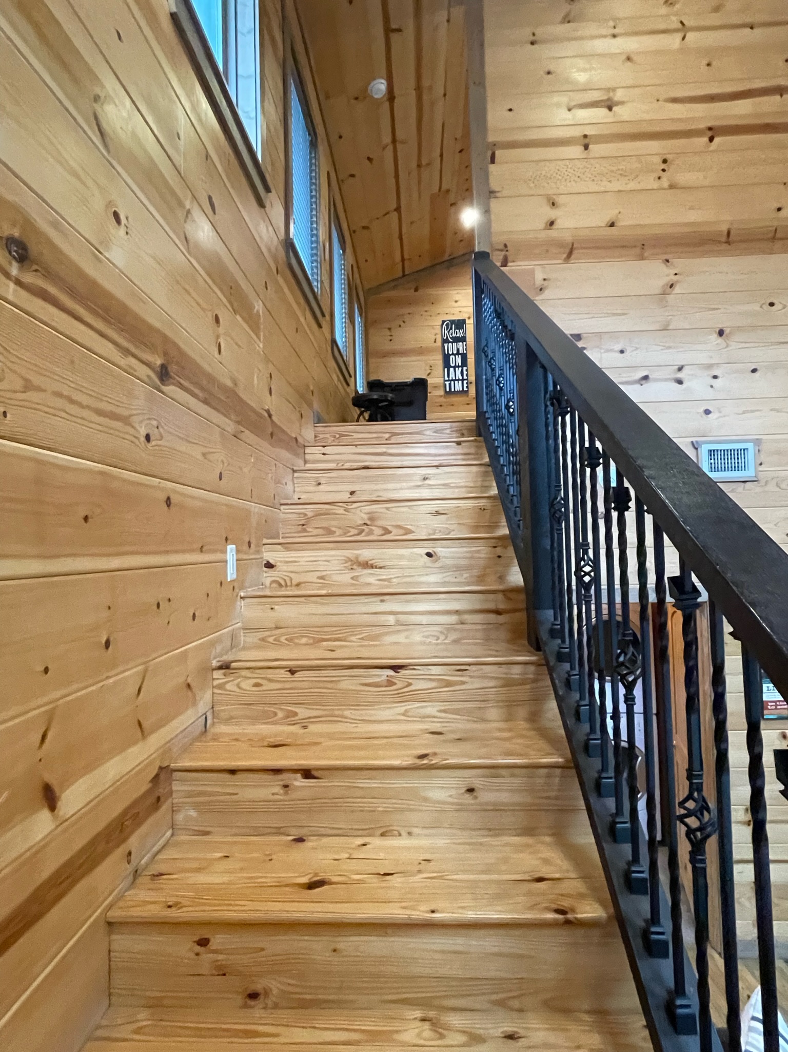 Head upstairs to the 2nd Master bedroom and game/bunk room.