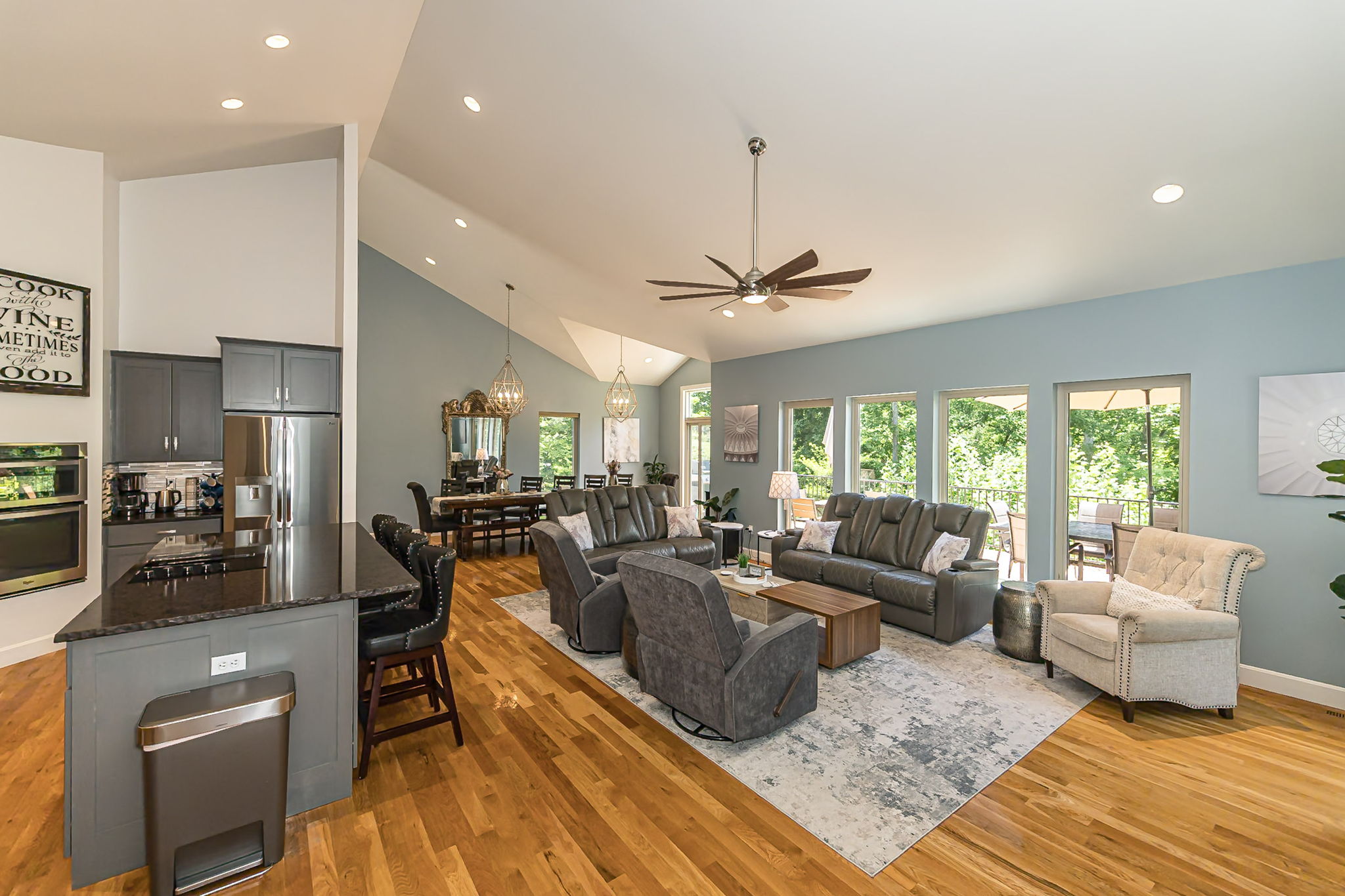 The living room flows seamlessly into the kitchen and dining area.