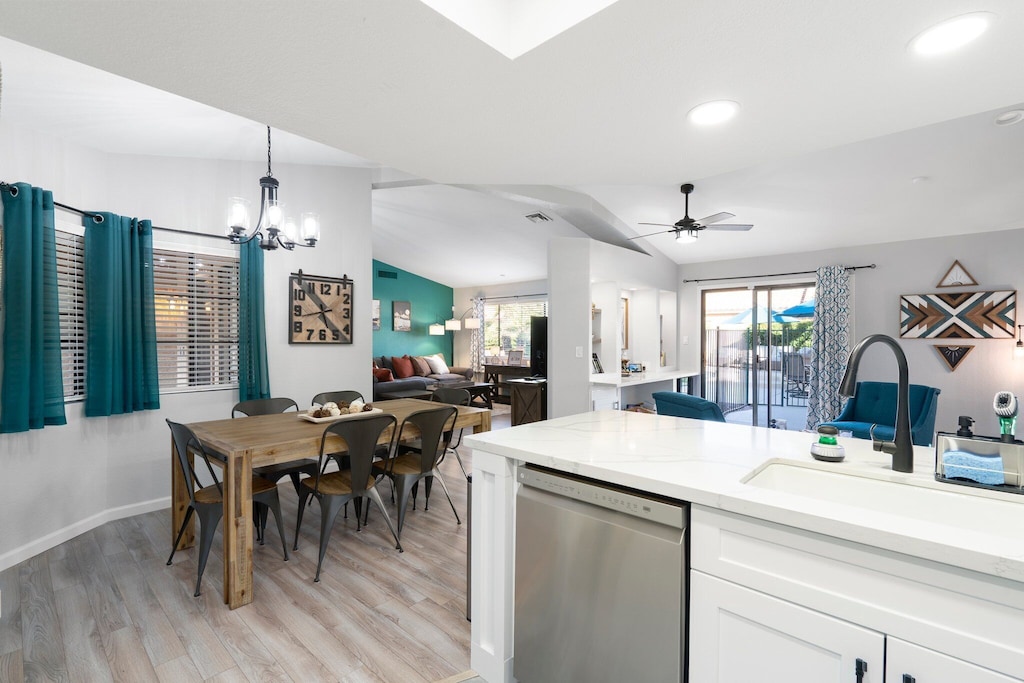 View from our FULLY LOADED Kitchen into the Living Room & Sitting Room. Enjoy cooking, baking, and hanging out with the family in our remodeled kitchen.
