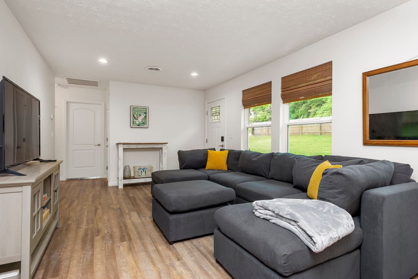 Come in and make yourself at home in our living room where everyone in your group can spend time together making memories at our French Broad River home.