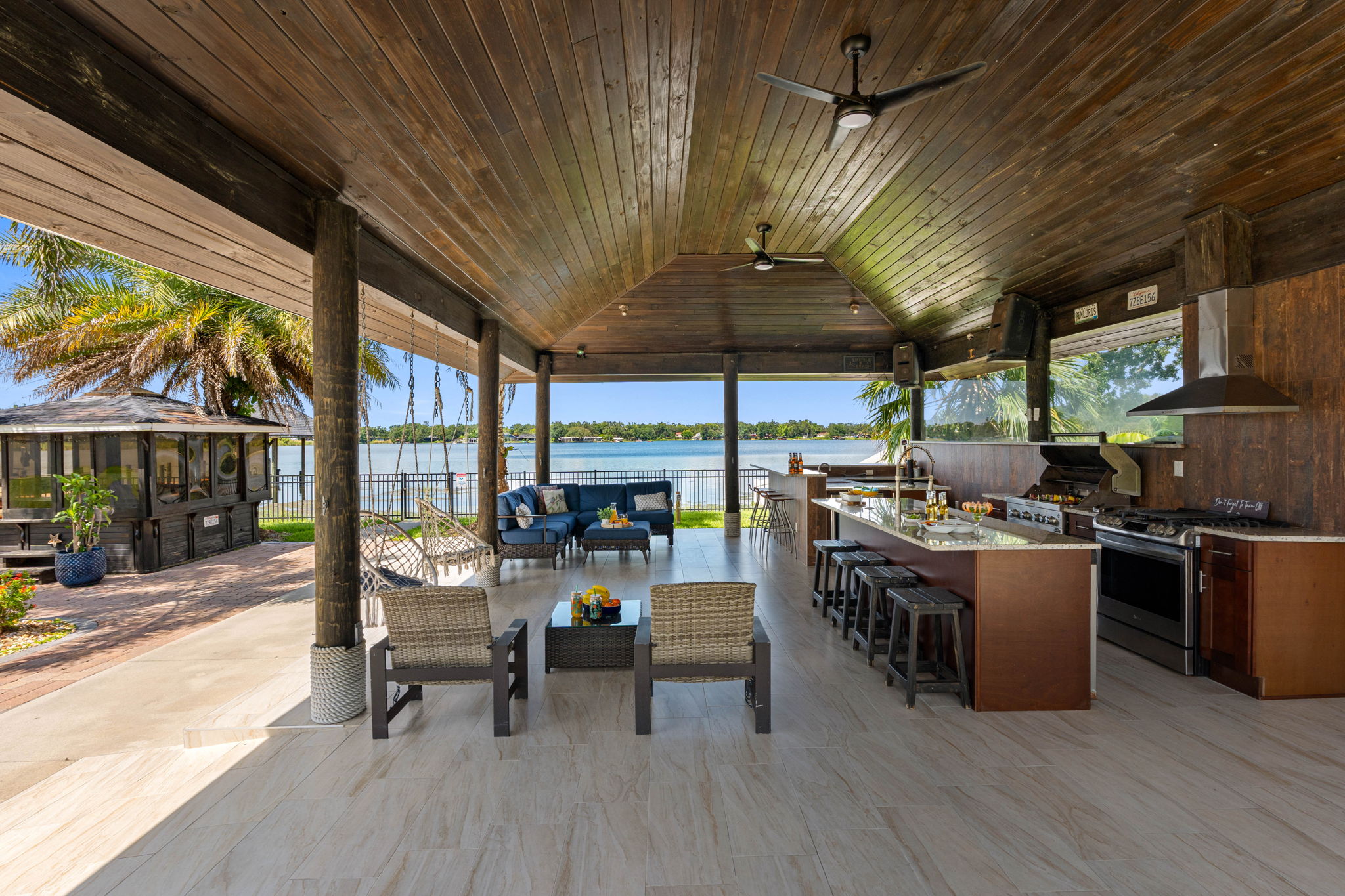 For guests who love to cook and dine outdoors, the property features a fully equipped outdoor kitchen that makes meal preparation a joy.