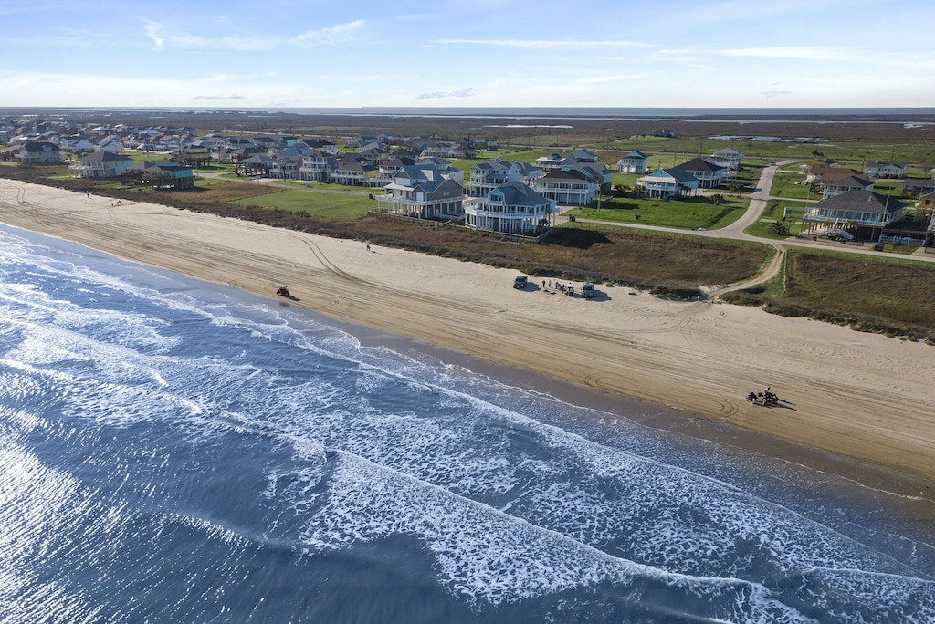 The exclusive community offers guests direct access to the beach.