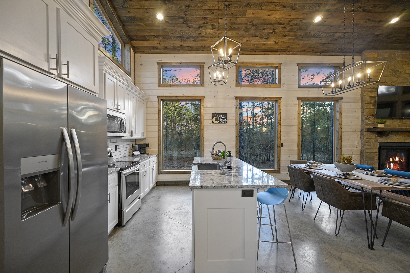 Open kitchen made for gathering — where morning coffee and evening laughter flow effortlessly.