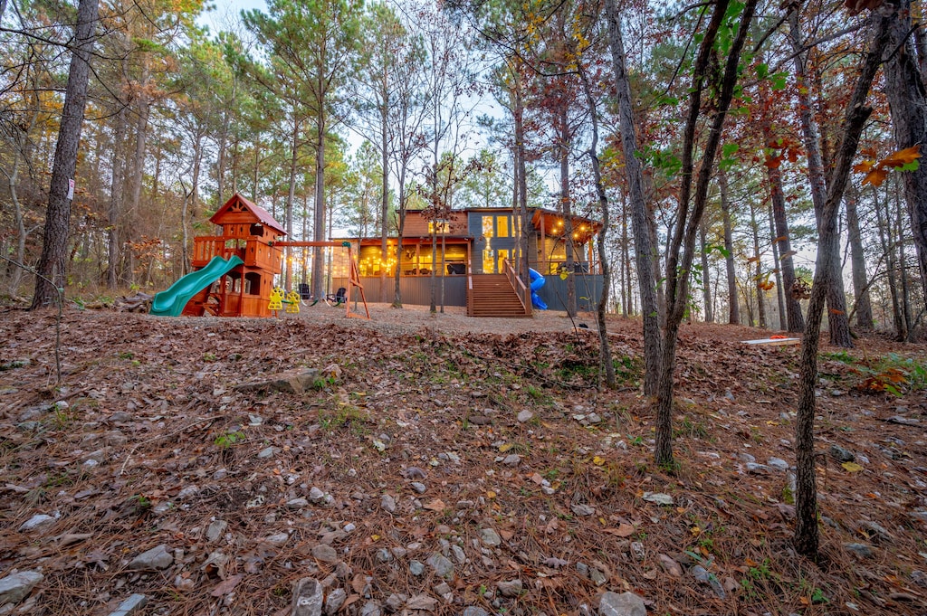 Relax or play under the pines in the amazing outdoor space at Bonfire Bliss!