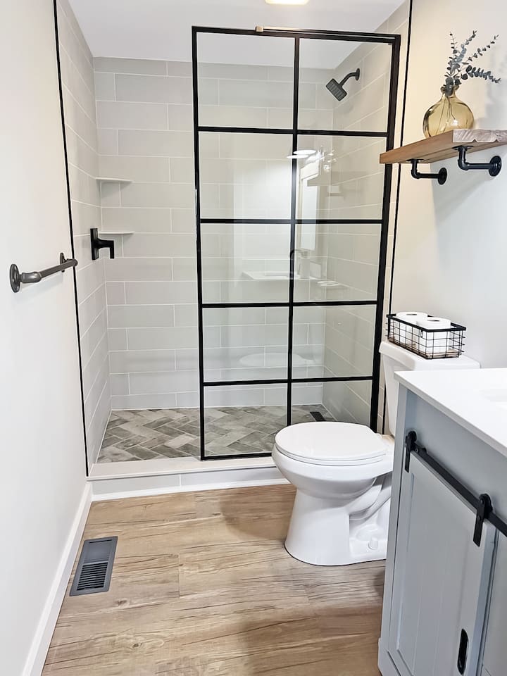 Full bathroom on main level of home with spacious stand up shower!