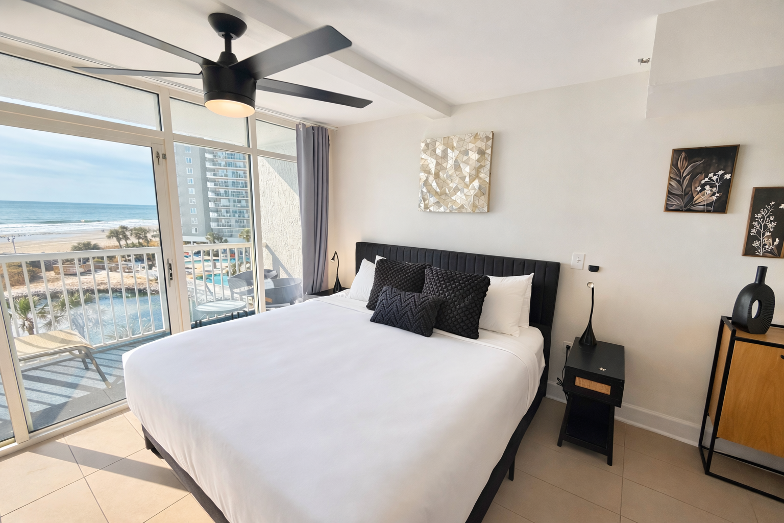 King Bed and Ceiling fan with oceanfront View right there