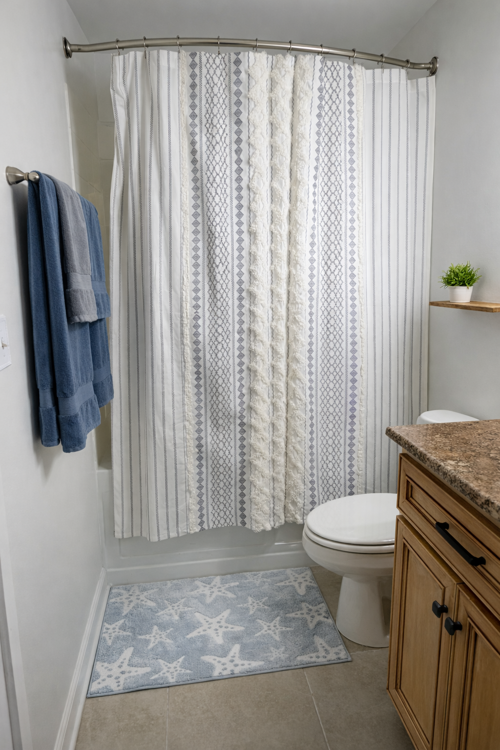 Bright, clean bathroom with full tub/shower