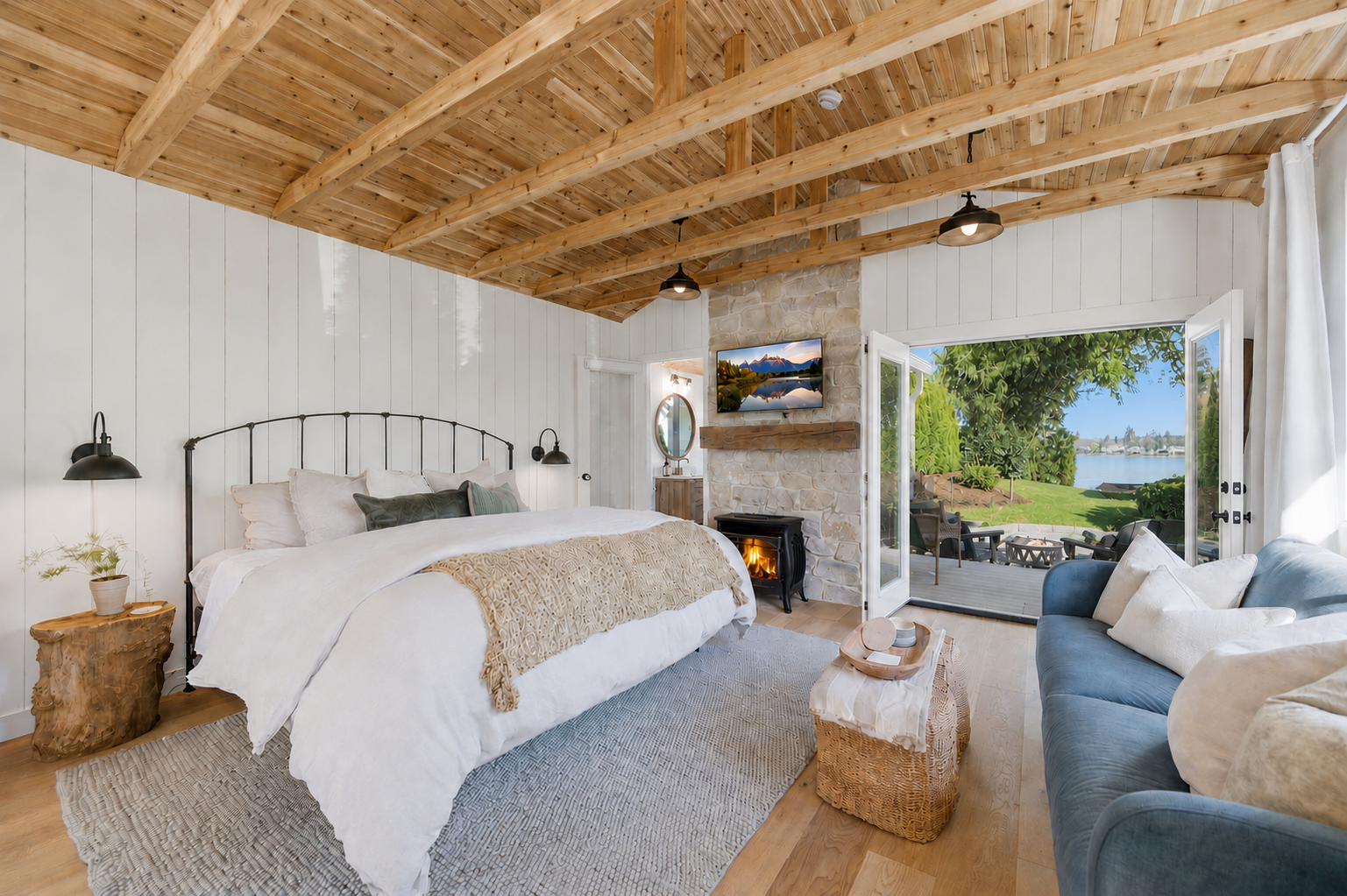 Intimate by design, unforgettable by experience—this luxe lakefront studio wraps you in soaring cedar warmth, vintage cottage soul, and front-row views of Lake Steilacoom.