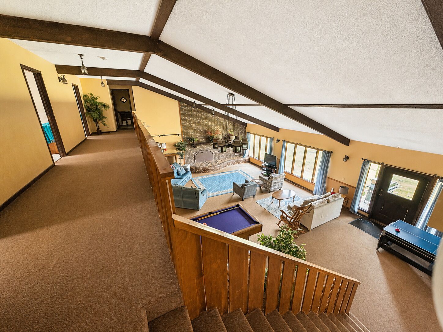 The open Great Room serves as the heart of the home, with three bedrooms conveniently located just down the hall upstairs.
