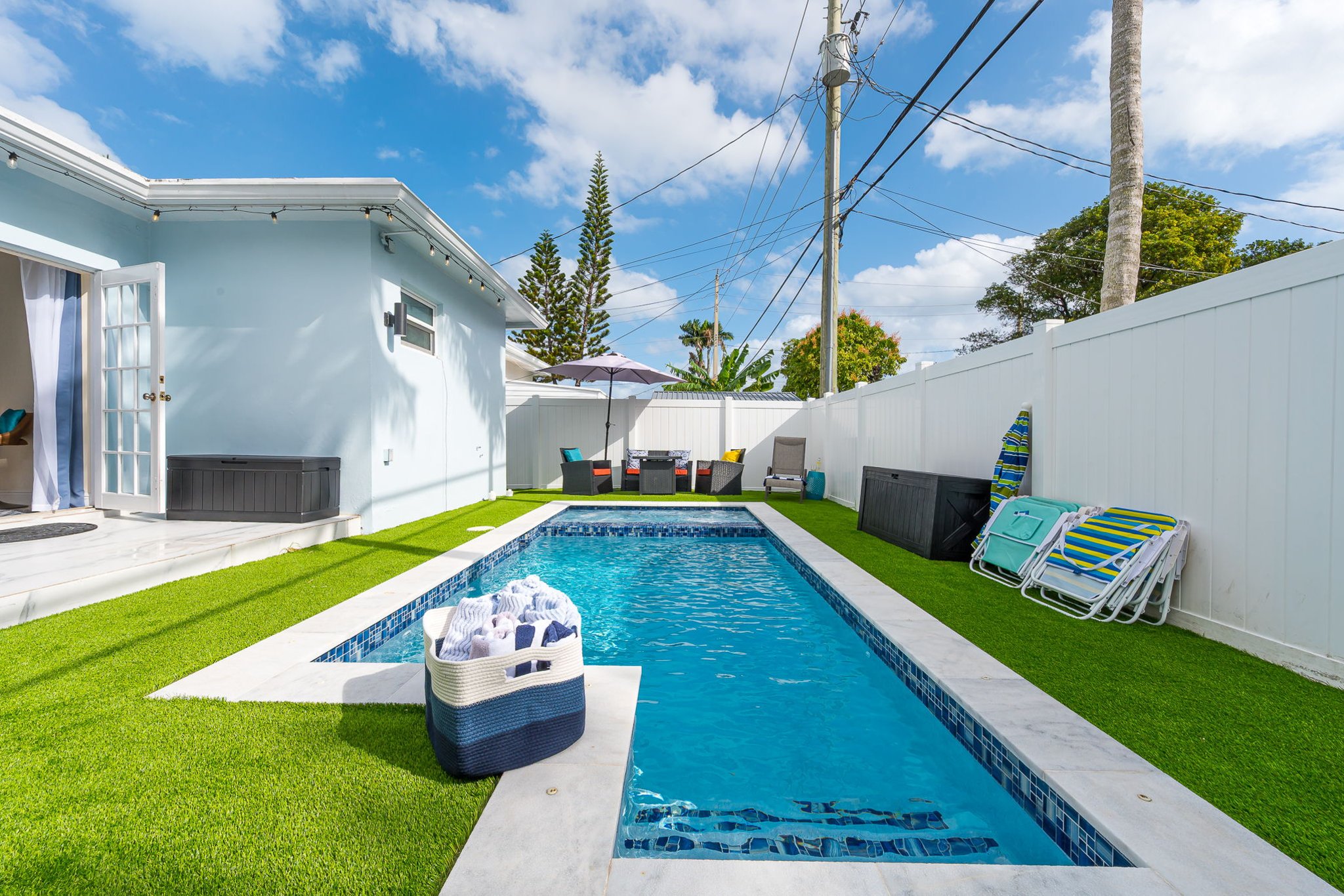 Enjoy your own private pool and hot tub, gas fire pit lounge, outdoor dining, and games—ideal for families and groups seeking a fun Florida escape.