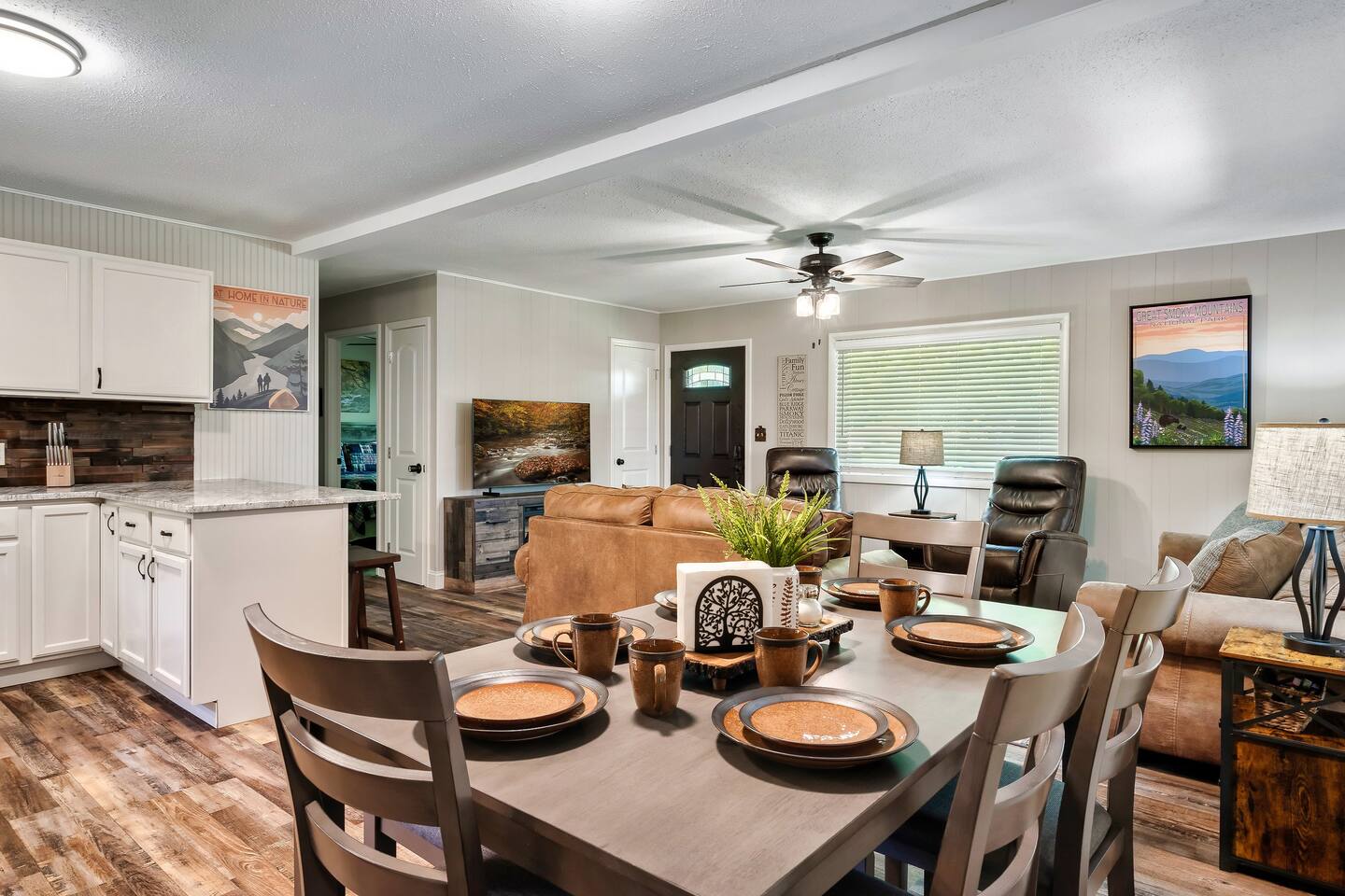 Experience Smoky Mountain charm in our open-concept Pigeon Forge retreat! Perfect for family game nights or cozy movie marathons. Enjoy our hot tub and fire pit after a day of adventure. Book now for the ultimate family-friendly getaway!