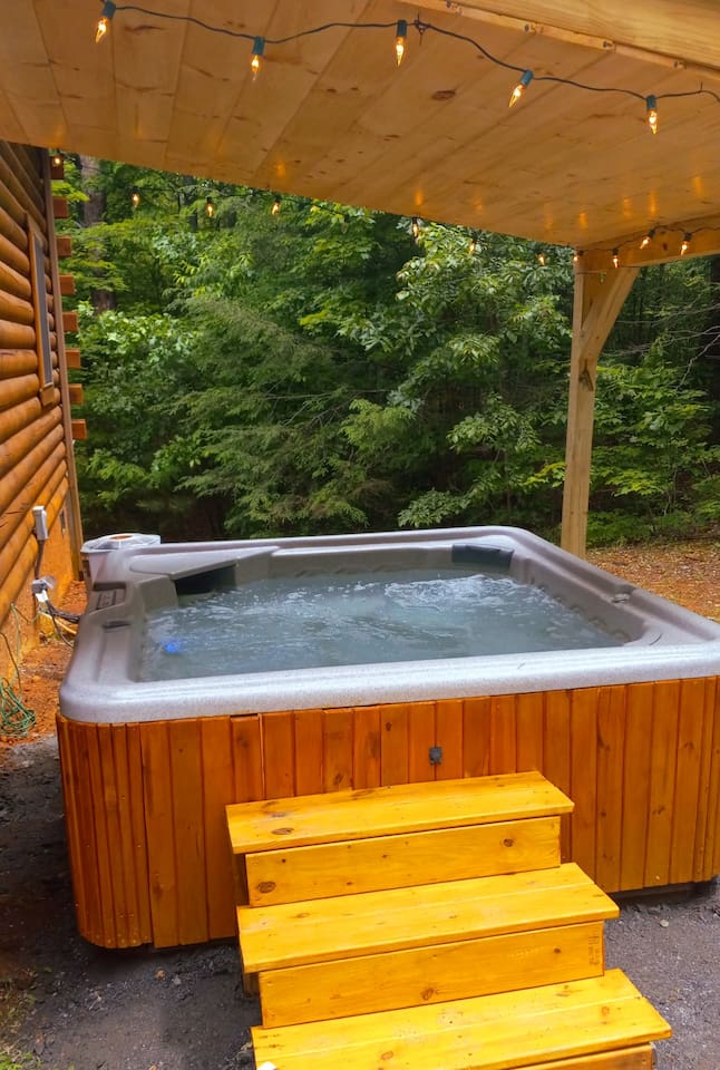 Very private backyard , open to acres and acres of wooded mountain preserve. Enjoy the hot tub surrounded by nothing but nature!