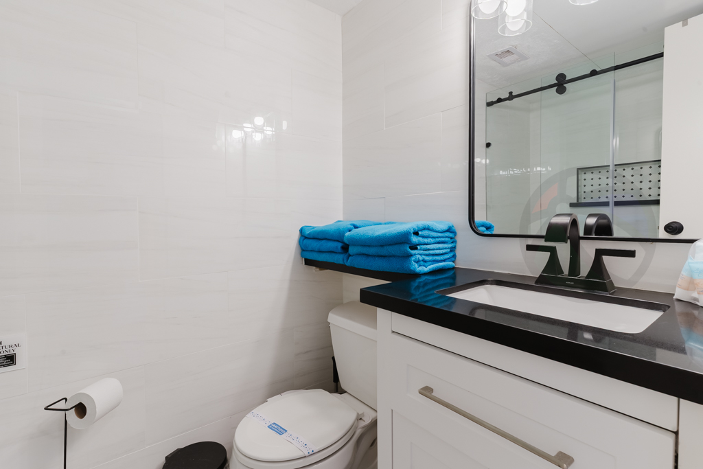 Nicely appointed restroom with tiled shower