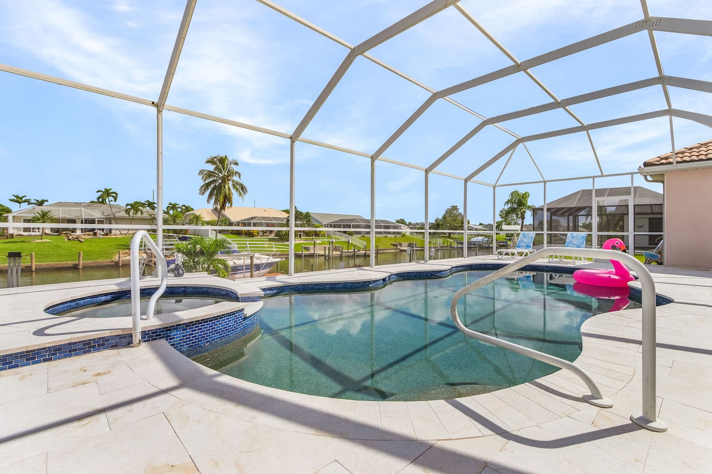 Stunning pool and spa area offering amazing water views for a truly exceptional experience!