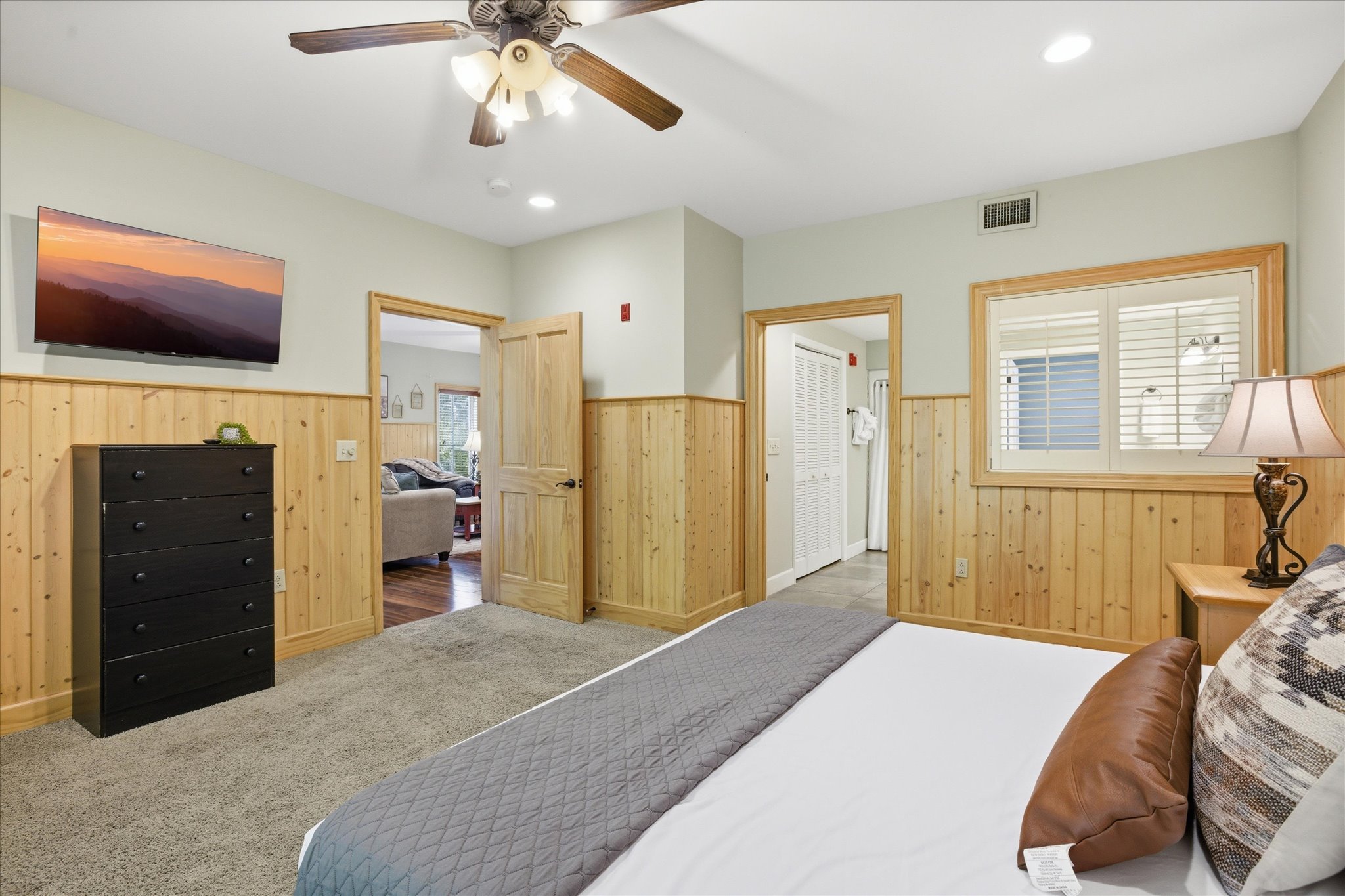 Stretch out in Unit 313’s spacious king bedroom, offering a calm, inviting space to rest and recharge after a day out.