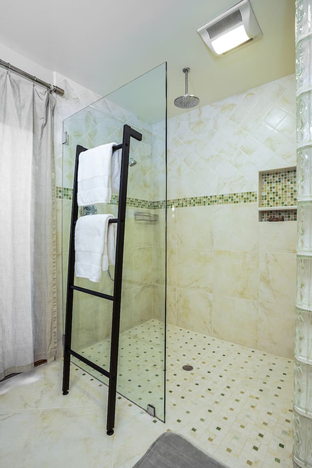 Primary bathroom with walk-in shower.