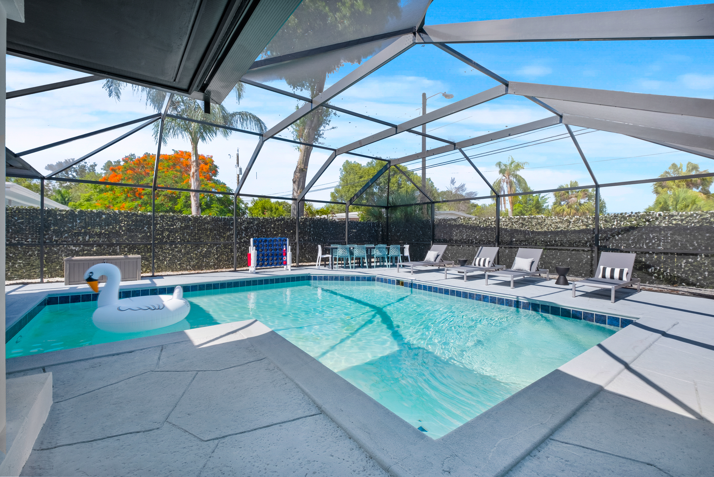 Outdoor dining area and pool toys