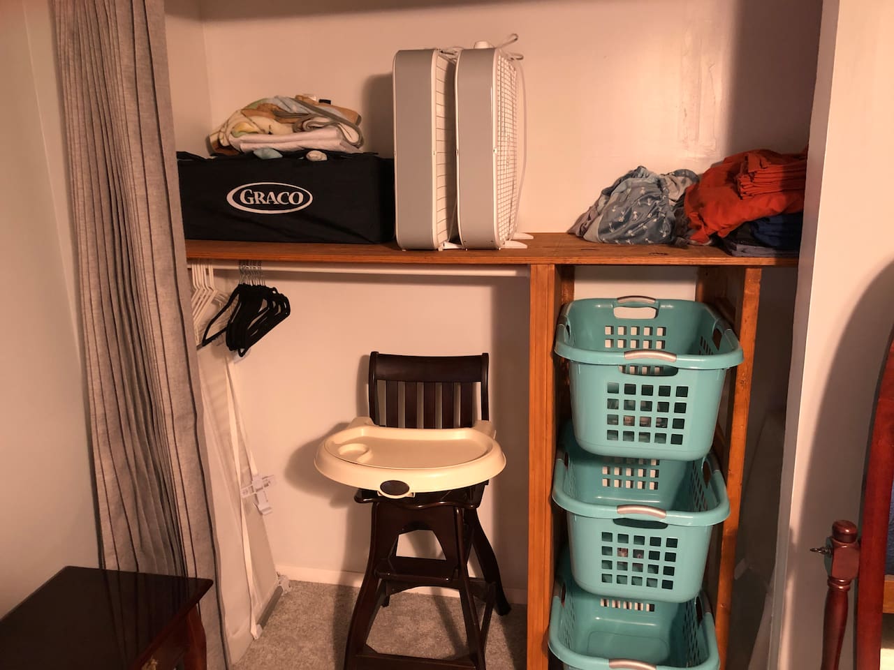 Box fans available for use. Pack-and-play and hi-chair for your little ones with plenty of linen and baby blankets. Extra linen for the bed if needed. Custom laundry basket organizer to dub as drawers for larger items.