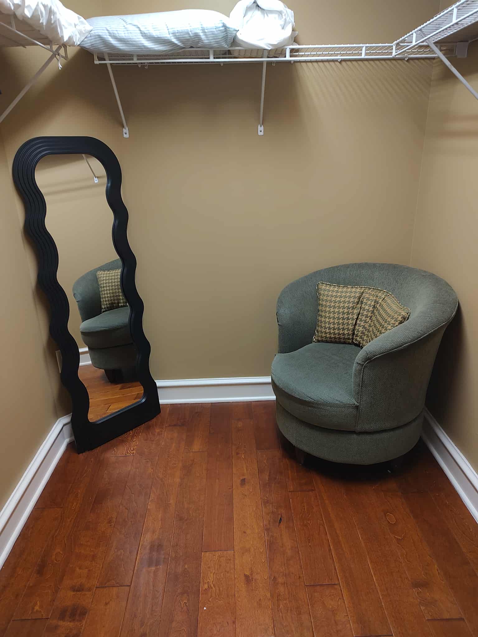Enjoy the dressing area located inside the large walk in closet in the Primary Bedrrom