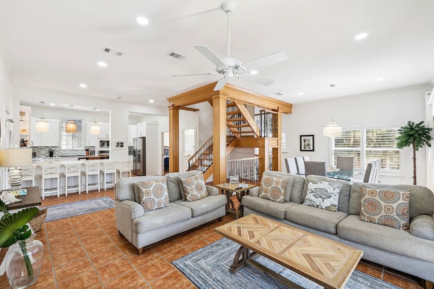 Inviting living room featuring ample seating, perfect for large families or groups to unwind together.