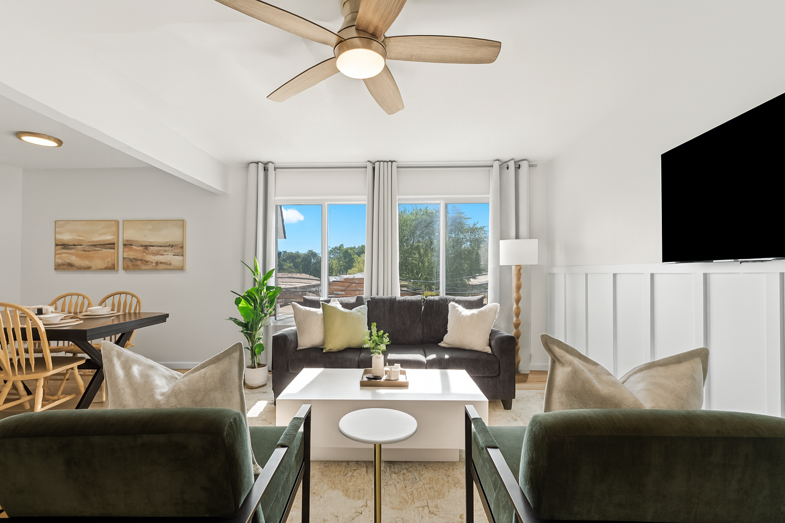 Dining area flows seamlessly into the living space, with bright views and a cozy atmosphere.