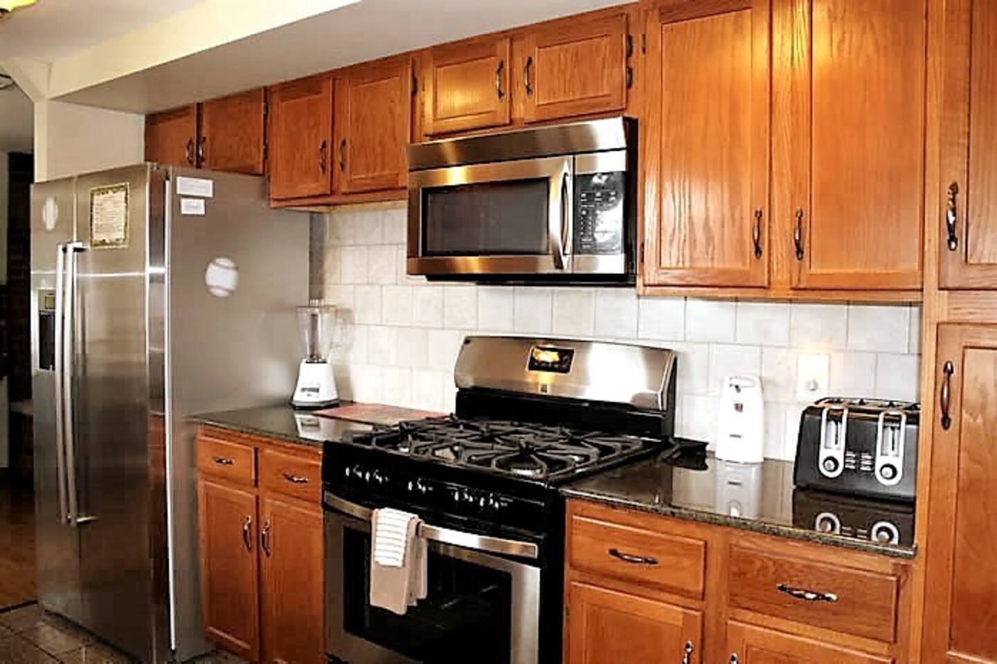 Stainless steel appliances, gas stove and over the range microwave