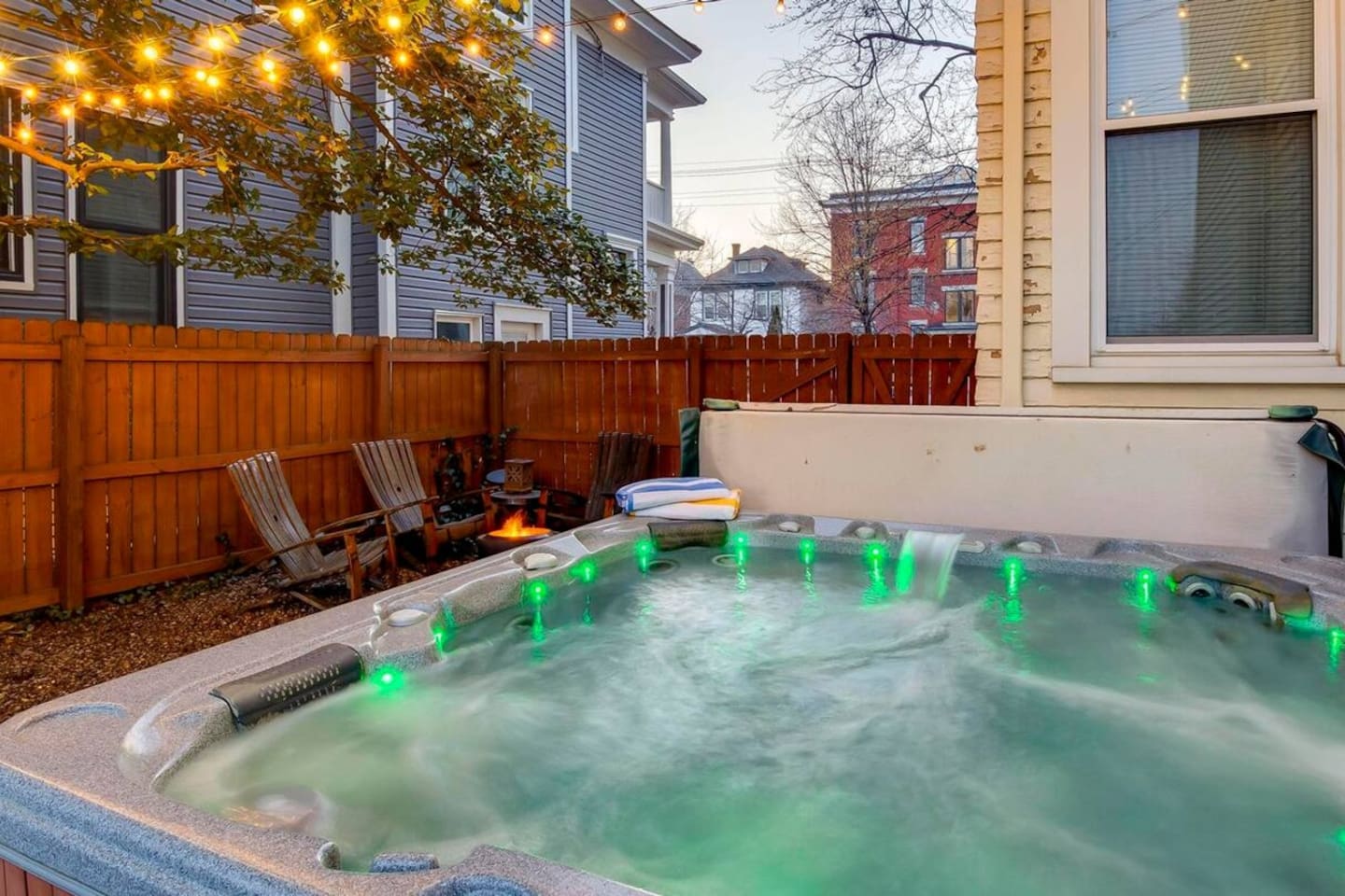 Outdoor patio and hot tub. Hot tub exclusively for the guests of this unit. 