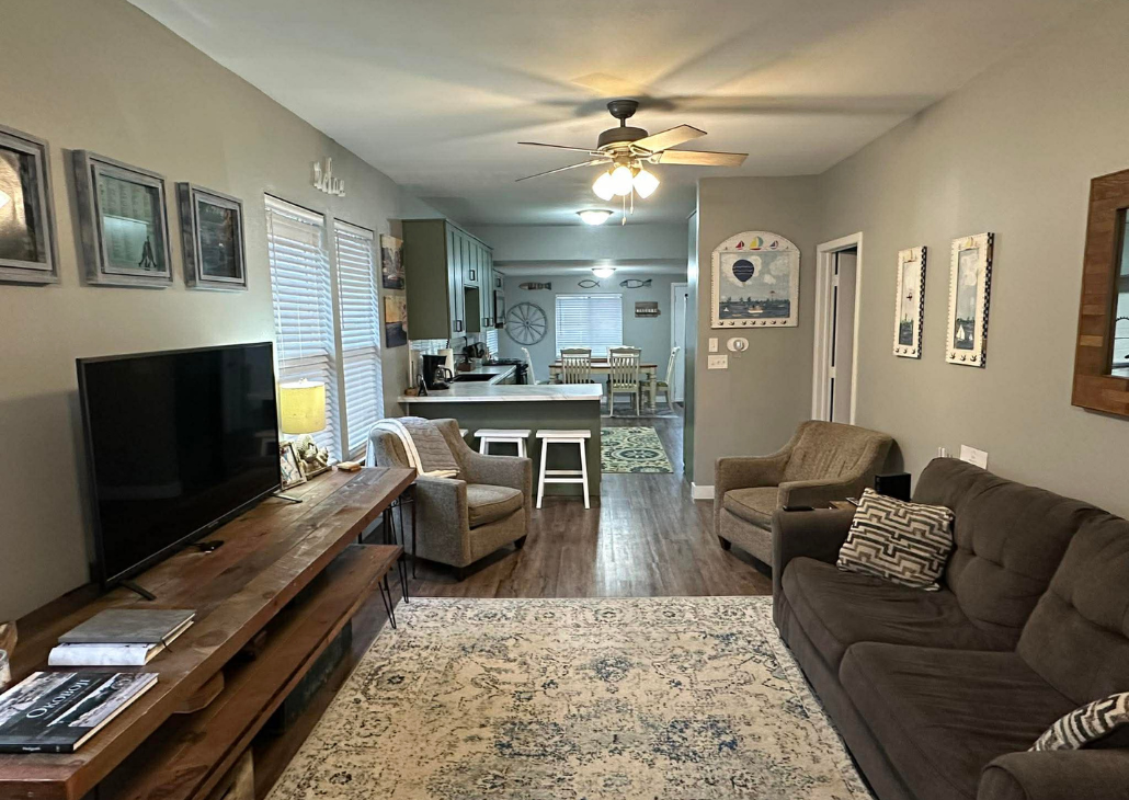 Living + kitchen dining room view.