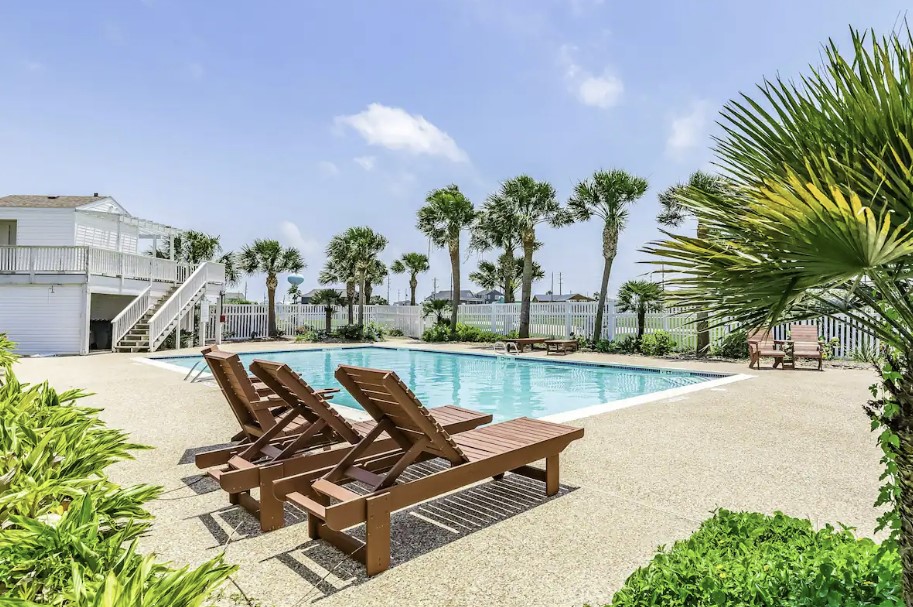 This beach house is located in a cozy, tranquil neighborhood on the west end of Galveston features a community pool.