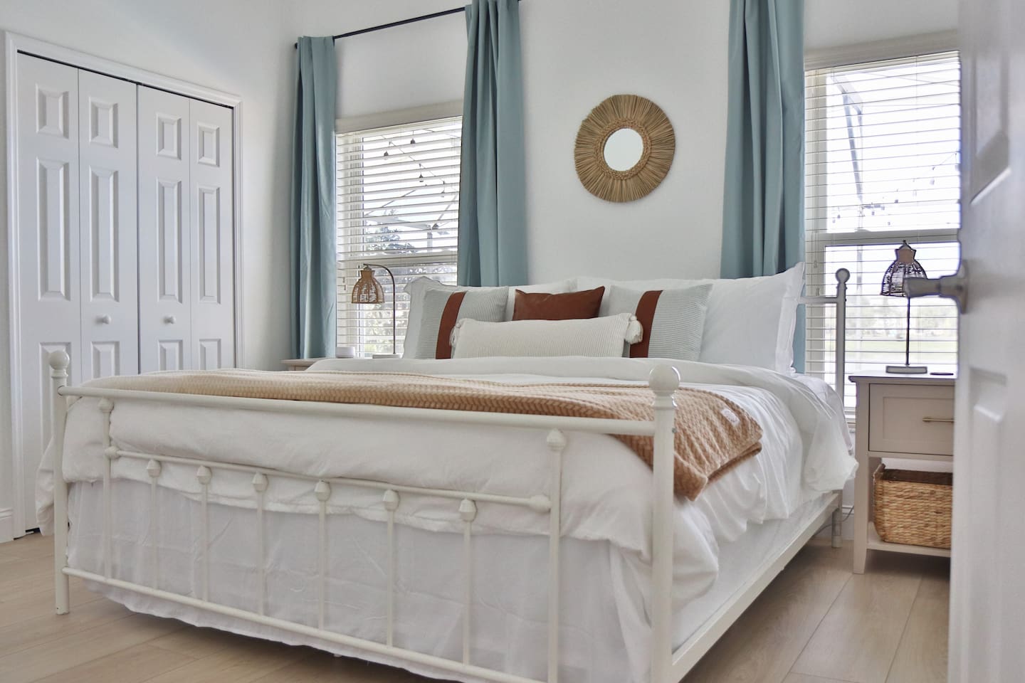 Master suite with a King sized bed and black out curtains