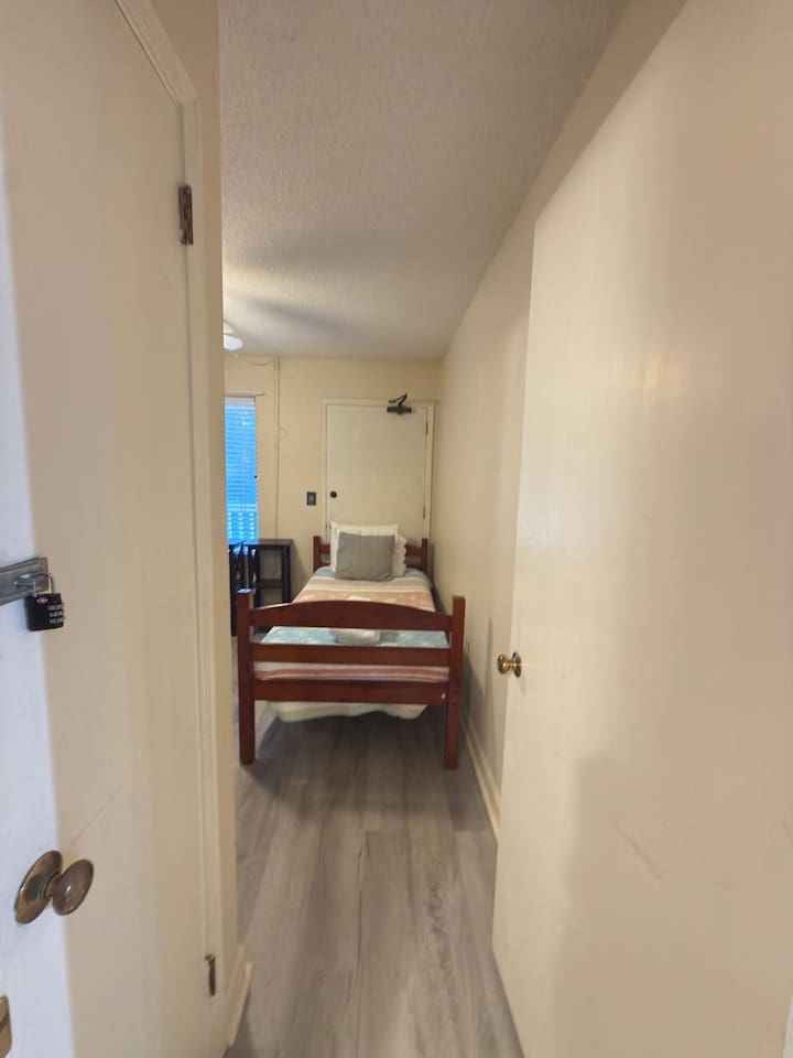 Twin bed by the door