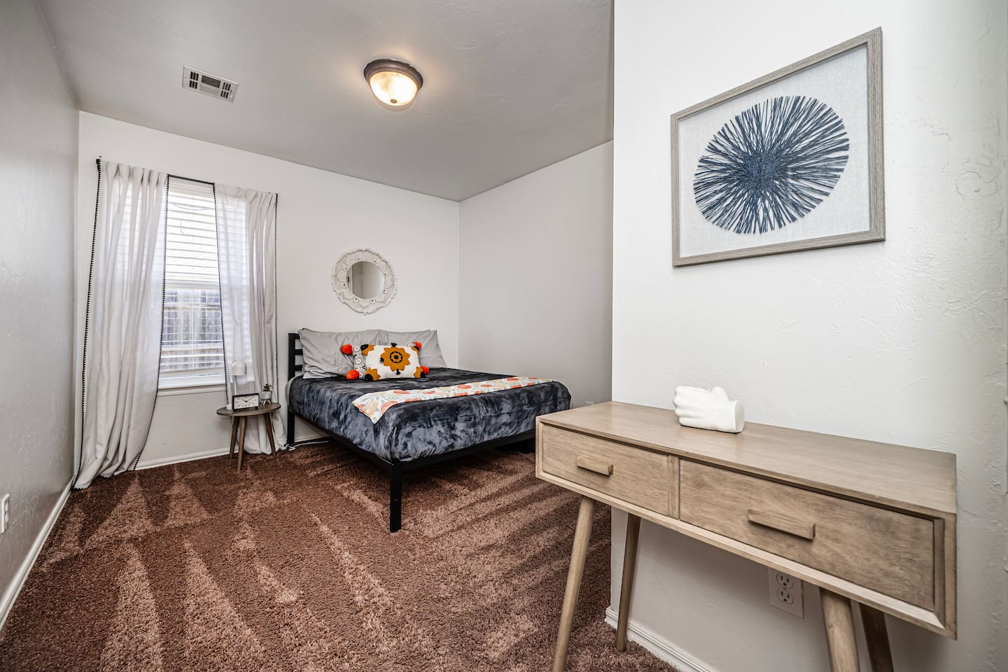 Inviting queen bedroom—perfect for friends, family, or extra guests.