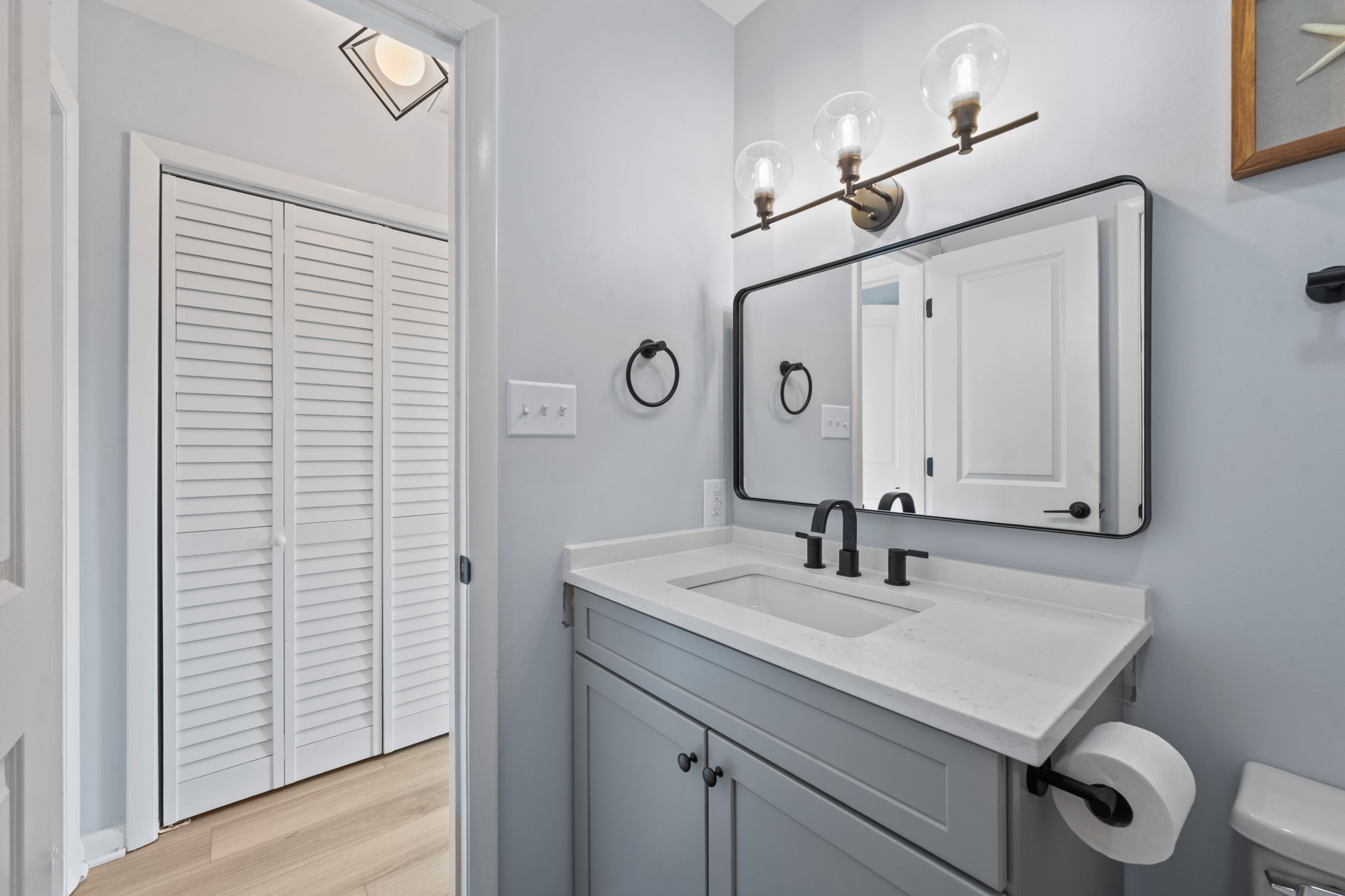 Single sink vanity with updated fixtures