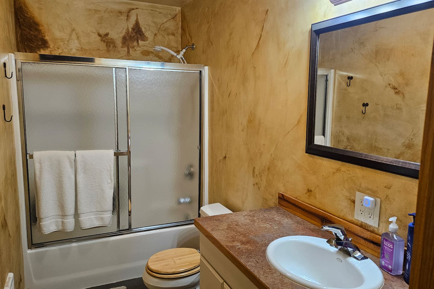 Bathroom 3 - bathtub/shower combo, adjacent to laundry.