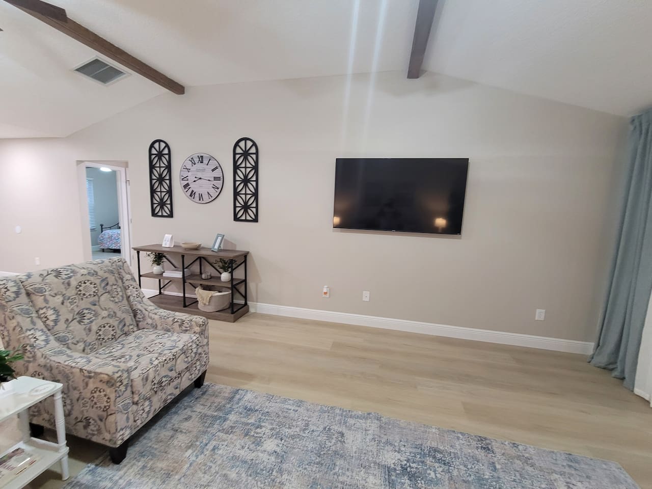65" tv in the living room! Please log in to your own streaming apps to access all of your favorite programs!