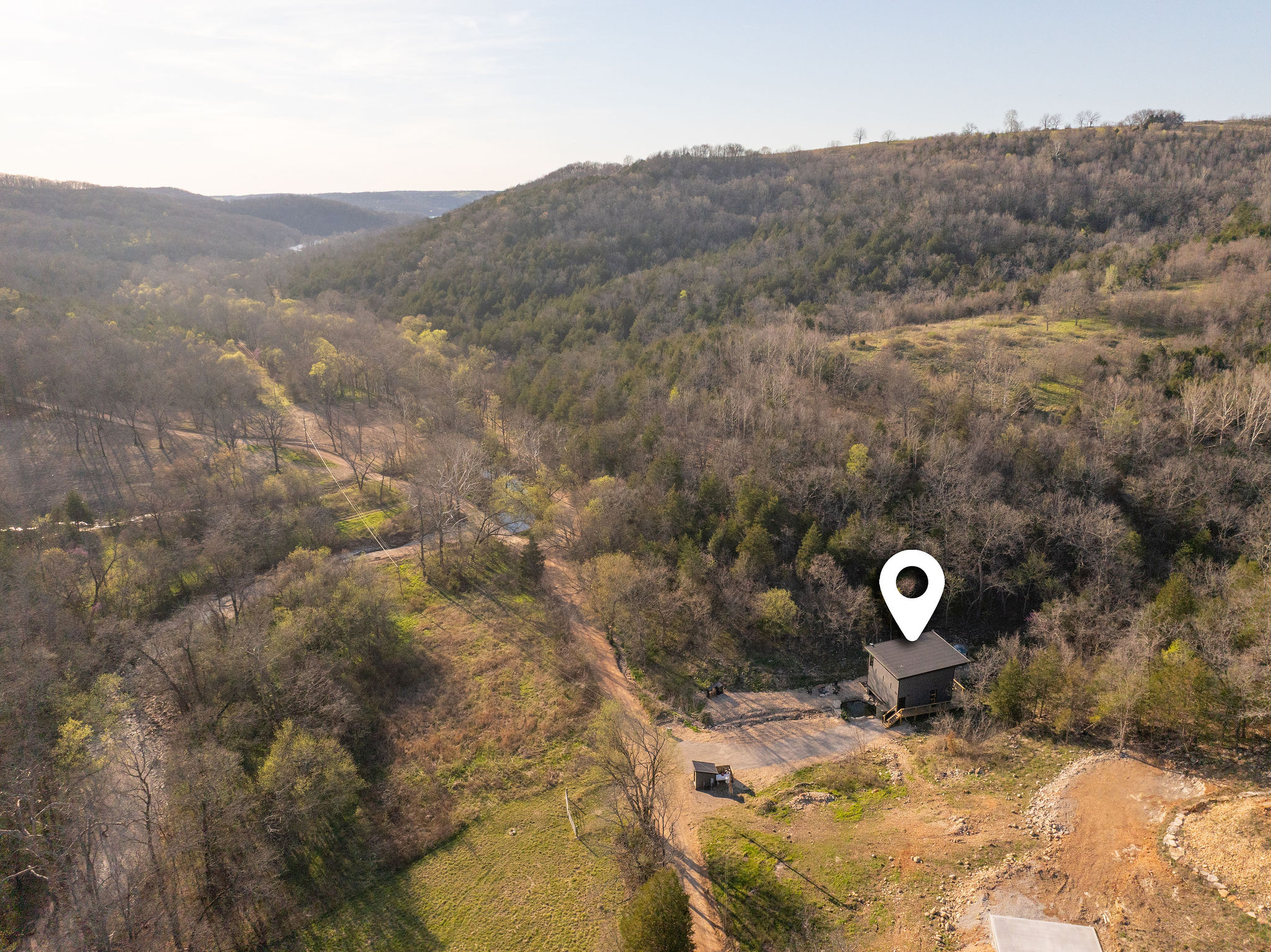 Aerial View: Echo Creek Loft is secluded in the natural beauty of the Ozarks while being within walking distance of Table Rock Lake and mere minutes from the nearest marina