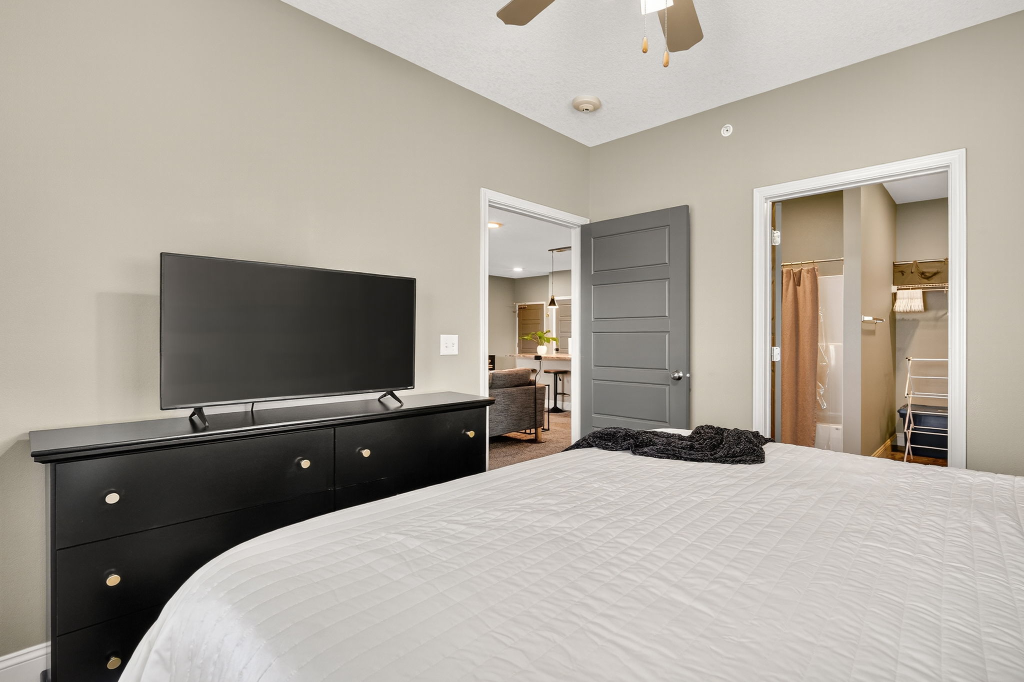 The primary bedroom also offers a smart TV for streaming, a full size dresser and its own ensuite bathroom for added convenience.
